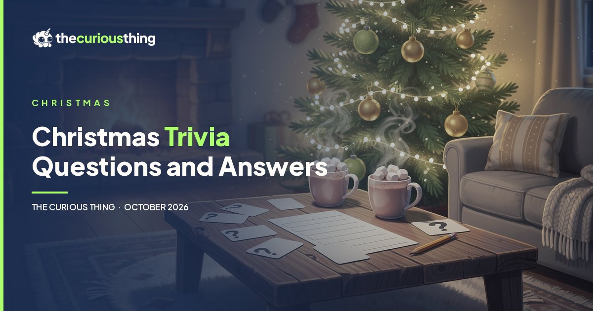 Christmas Trivia Questions and Answers: trivia cards, a score sheet and cocoa by a glowing Christmas tree, from The Curious Thing